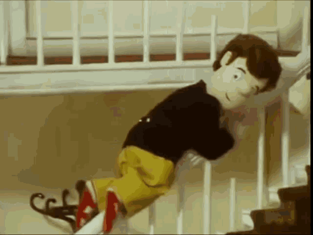 a cartoon character is climbing up the stairs