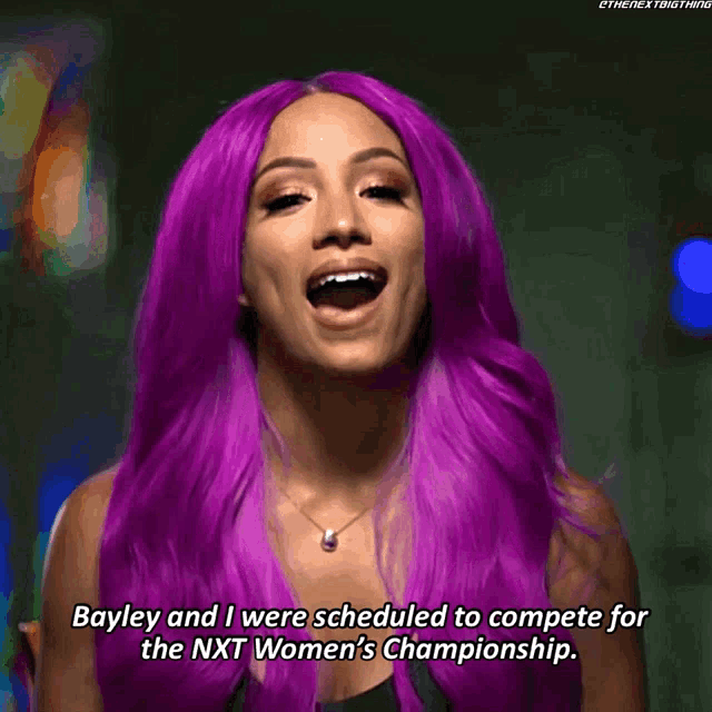 a woman with purple hair says bayley and i were scheduled to compete for the nxt women 's championship ..