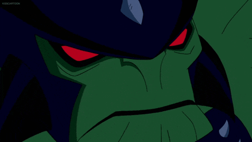 a close up of a cartoon character 's face with red eyes and the words kidscartoon on the bottom