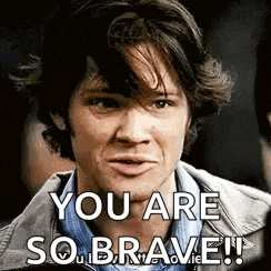 a man is making a funny face with the words `` you are so brave '' .