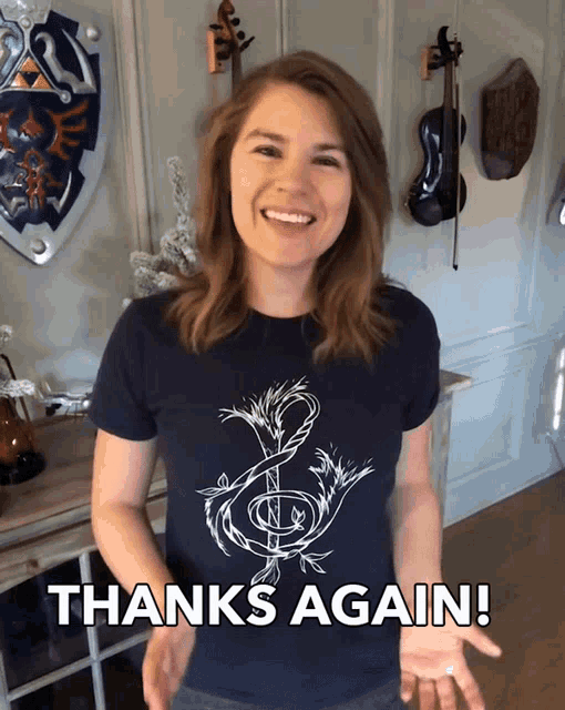 a woman wearing a shirt that says " thanks again "