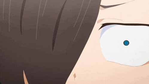 a close up of a person 's face with a white eye