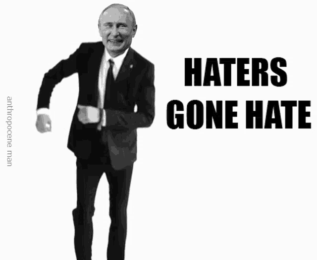 a picture of a man in a suit and tie with the words haters gone hate on the bottom