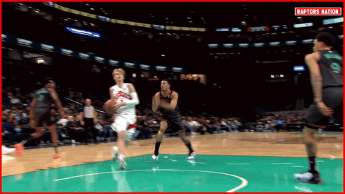 a basketball game with the word raptors nation on the bottom right