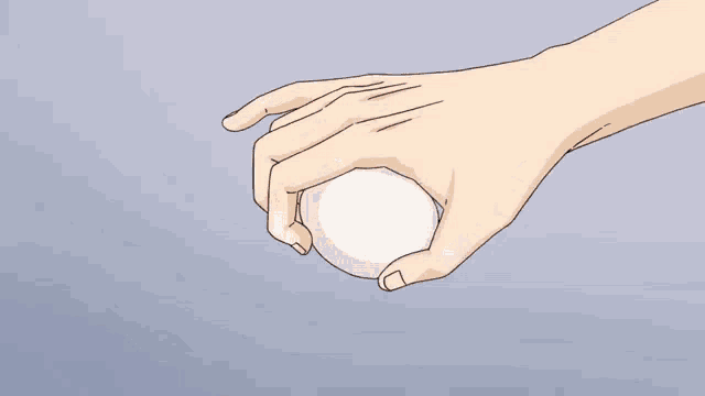 a hand is holding a piece of paper that says 00