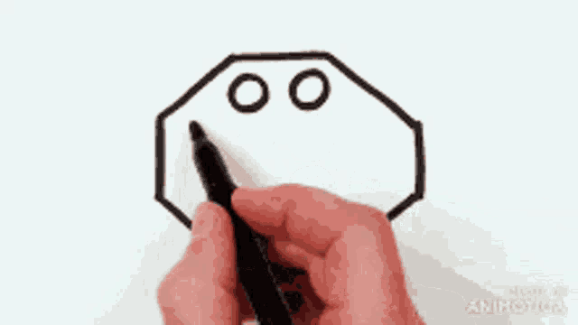 a person is drawing an octagon with circles on it