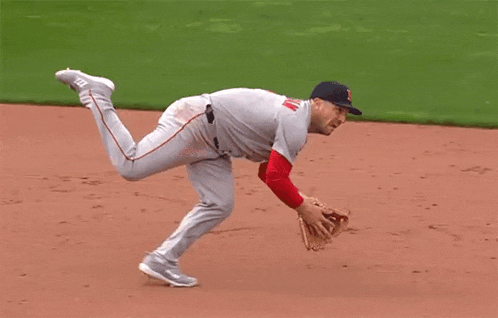 a baseball player wearing a jersey that says ' washington reds ' on it