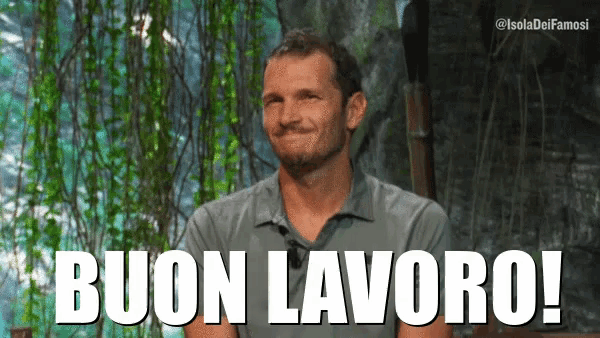 a man is smiling and says buon lavoro in white letters