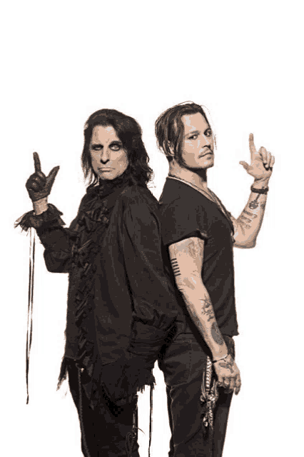 a man with a tattoo on his arm stands next to another man with a tattoo on his arm