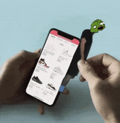 a person is holding a cell phone with a cartoon character on the screen