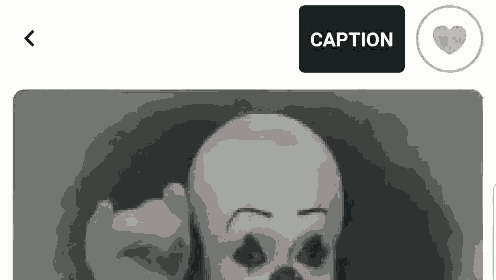 a picture of a skeleton with a caption button and a heart