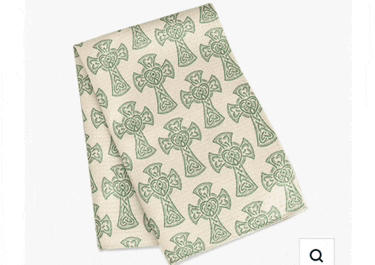 a towel with celtic crosses on it