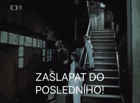 a black and white photo of people walking down stairs with the words zaslapit do posledniho