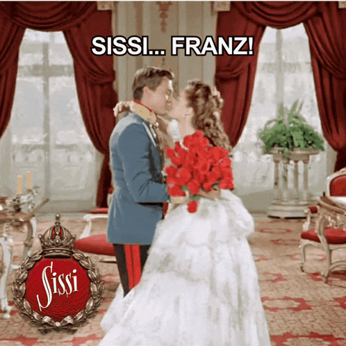 a man and woman kissing in front of a sign that says sissi