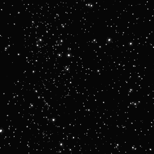 a black and white image of a starry night sky