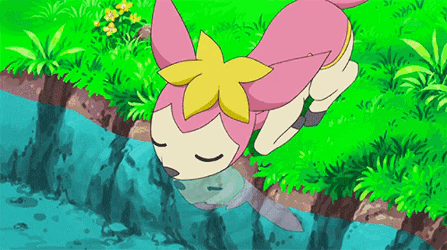 a pink and white pokemon is drinking water from a river .