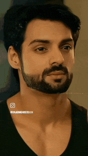 a close up of a man 's face with a beard and the words bajaj singh blession on the bottom right