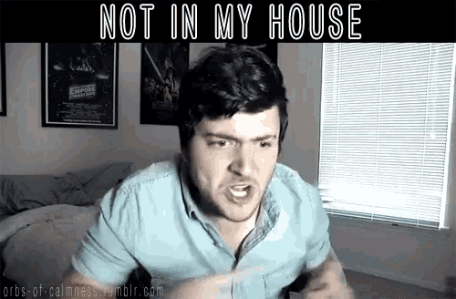 a man is making a funny face with the words " not in my house " above him