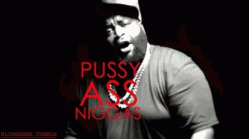 a black and white photo of a man with the words pussy ass niggas