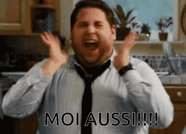 a man in a white shirt and tie is screaming with the words moi aussi written below him