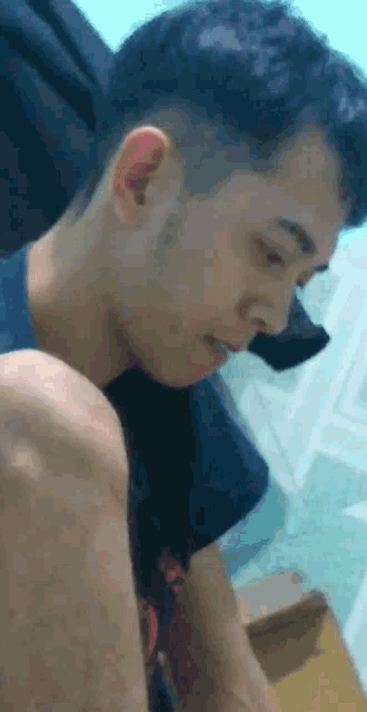 a close up of a man 's face and neck