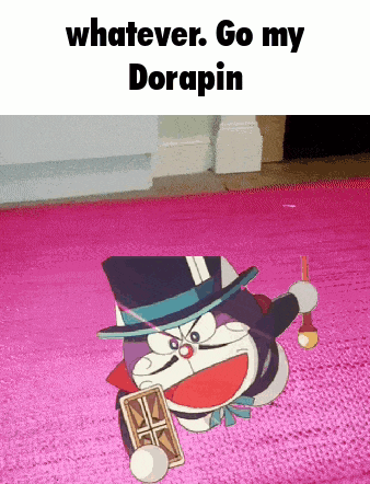 doraemon is laying on a pink rug holding a bottle and a playing card