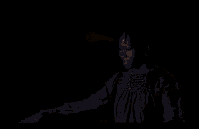 a dark room with a light coming out of the corner