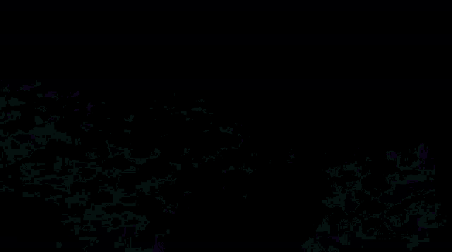 a purple background with a black hole in the middle of it