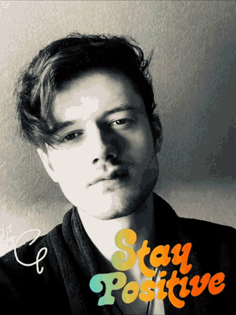 a black and white photo of a man and the words stay positive