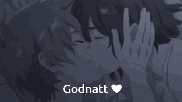 a picture of a couple kissing with the word godnatt above them
