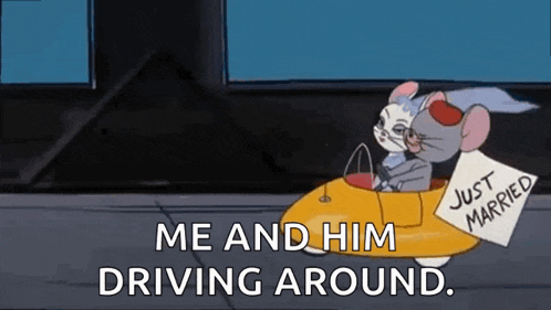 a cartoon of tom and jerry driving around with a sign that says just married .