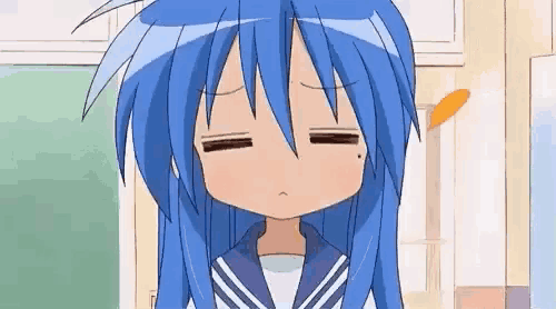 a cartoon girl with blue hair is making a funny face .