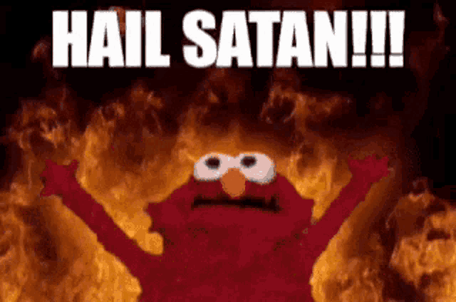 elmo from sesame street is standing in front of a fire with the words `` hail satan !!! '' written on it .