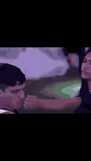 a man and a woman are sitting at a table