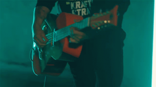 Tocando La Guitara Oscar Cortez GIF - Tocando La Guitara Oscar Cortez Jugando La Guitarra GIFs