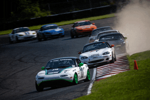 a race car that has the word motorsports on the front