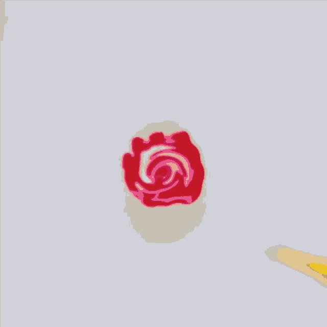 a yellow pencil has a red rose on it