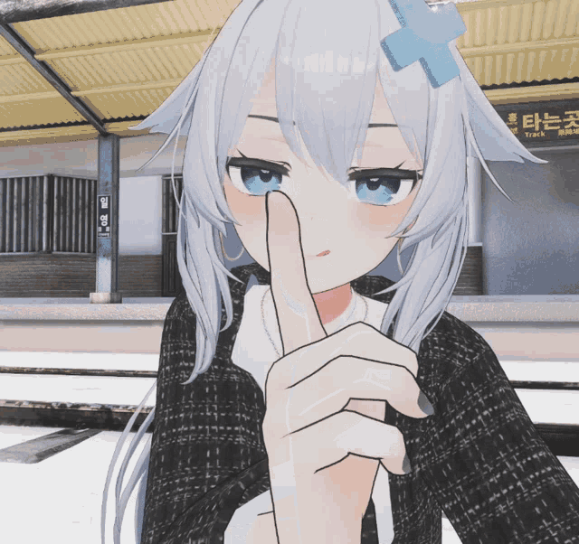 a girl with white hair and blue eyes holds her finger to her face