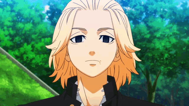 a close up of a cartoon character with blonde hair and blue eyes