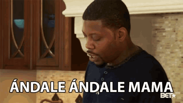 a man in a kitchen says andale andale mama in spanish