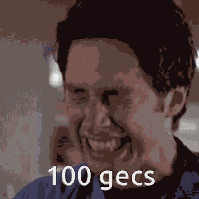 a pixelated image of a man laughing with the words 100 gecs below him