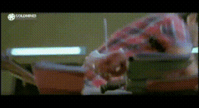 a blurred image of a person with the word goldmines on the bottom