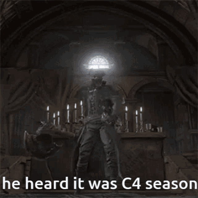 a man in a white coat is holding a sword in a dark room .