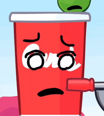 a red cup with a sad face and a green ball on top of it