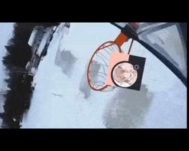 a basketball hoop in the snow with a picture of a person in it