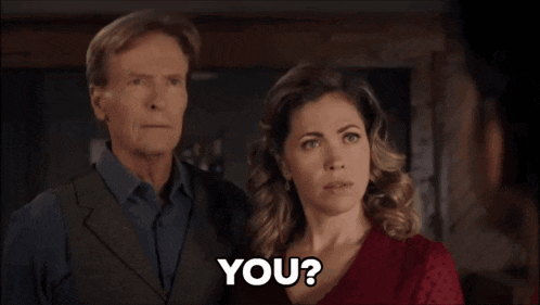 a man and a woman are standing next to each other and the woman says you