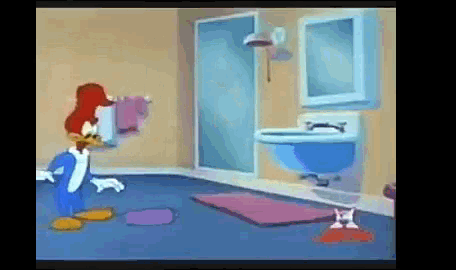 woody woodpecker is standing in a bathroom with a sink and mirror