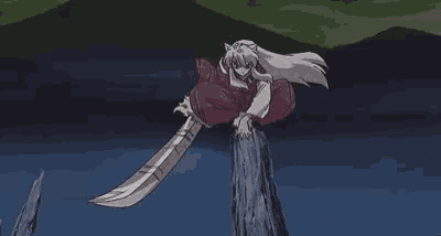 a person is sitting on top of a tree stump holding a sword .