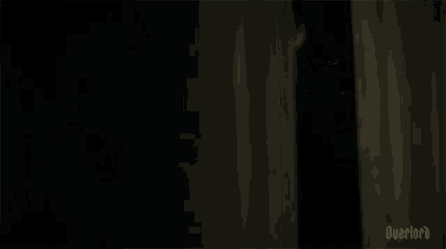 a close up of a man 's face peeking out of a doorway .