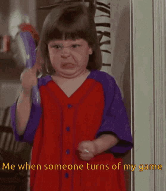a little girl in a red and purple shirt says me when someone turns of my game ..